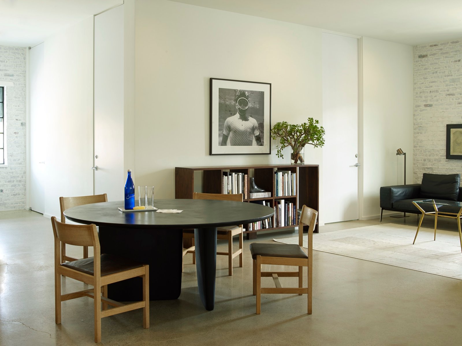 Studio setting at 2301 Westheimer Road with a sculptural table and layered materials